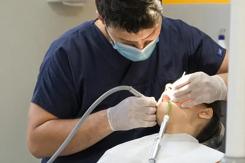 Dentist with child patient