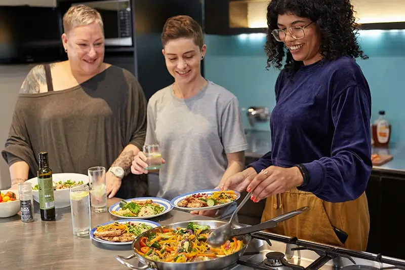 Women cooking together